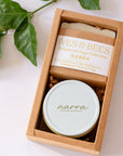 A gift box containing Narra soap and mini candle from Ives & Bees Filipino Heritage Collection.