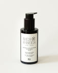A bottle of Ives & Bees Mineral & Plant-Based Sunscreen SPF 30, featuring a black pump dispenser and a white label, set against a plain light background.