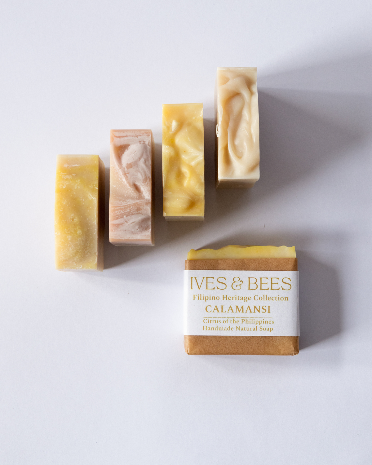 Ives & Bees Calamansi soap bars on a white background