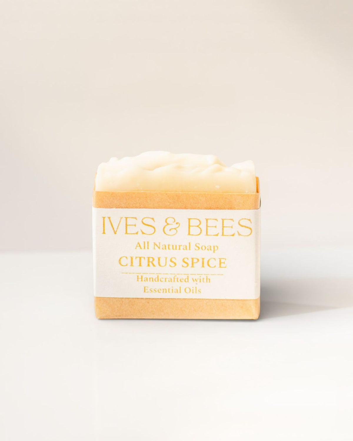 Handmade Citrus Spice Soap with 'Ives & Bees' branding on a light background