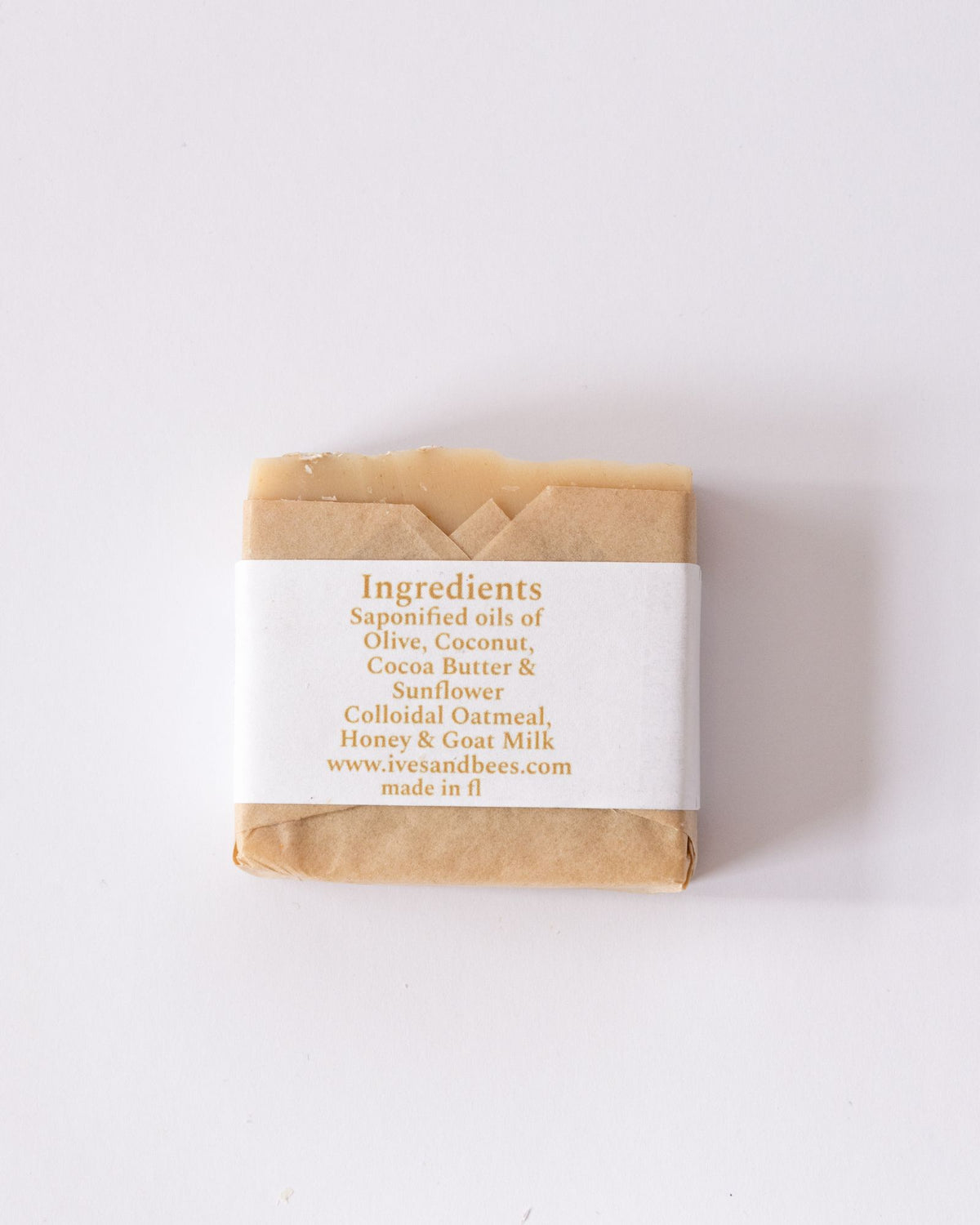 Cocoa, Oats & Honey Goat Milk Soap with a label on a white background