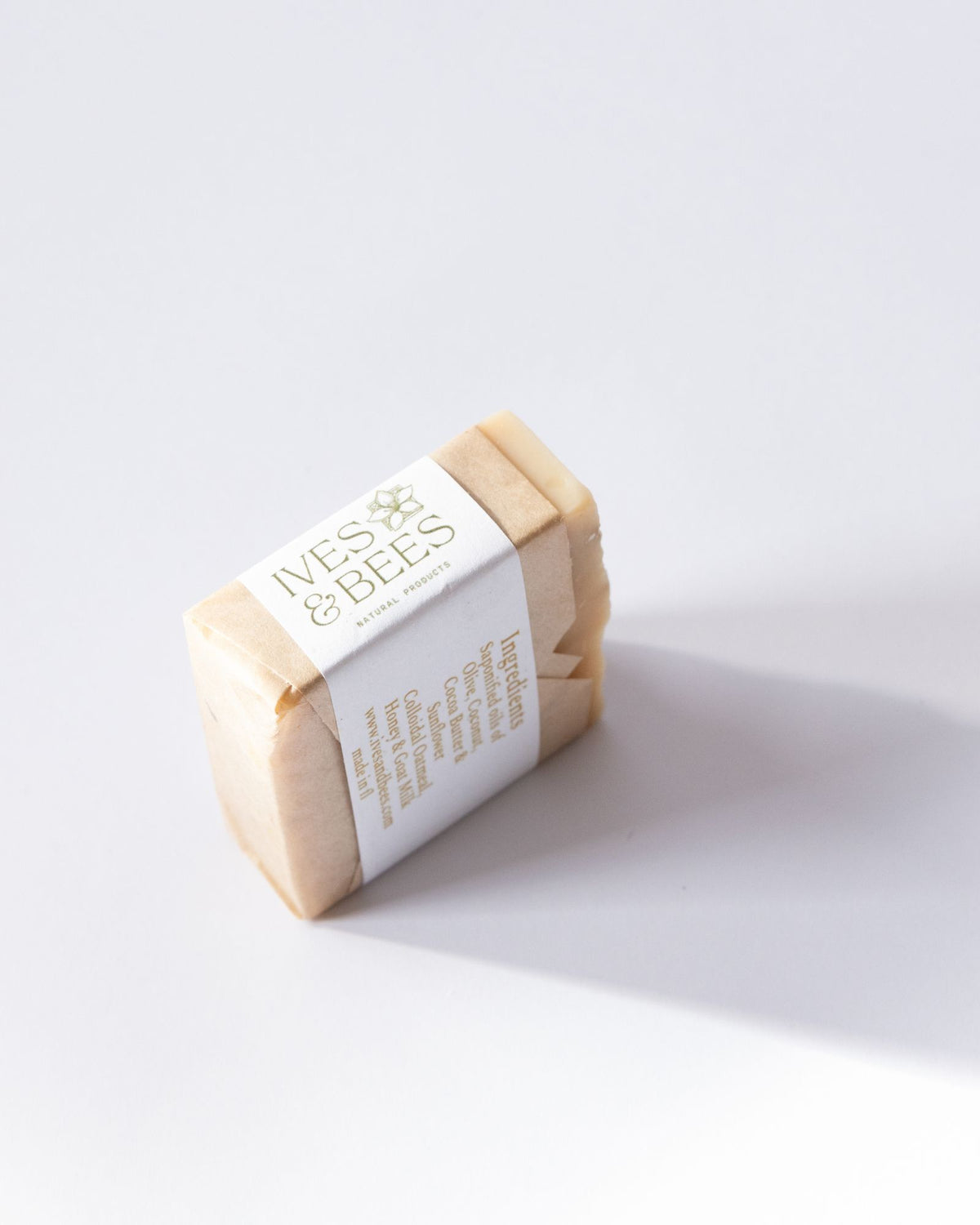Cocoa, Oats & Honey Goat Milk Soap of soap with a label on a white background