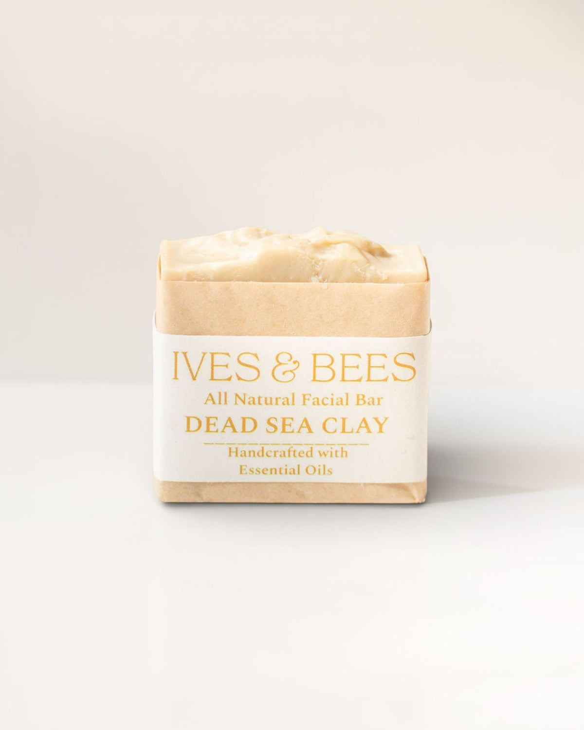 Dead sea clay soap with 'Ives & Bees' branding on a white background