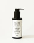 A black pump bottle of Ives & Bees Facial Cream Wash with a white label, set against a plain white background.