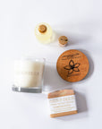 Handmade Filipino Heritage Sampaguita Gift Set including a candle, soap, and wooden coaster on a white background