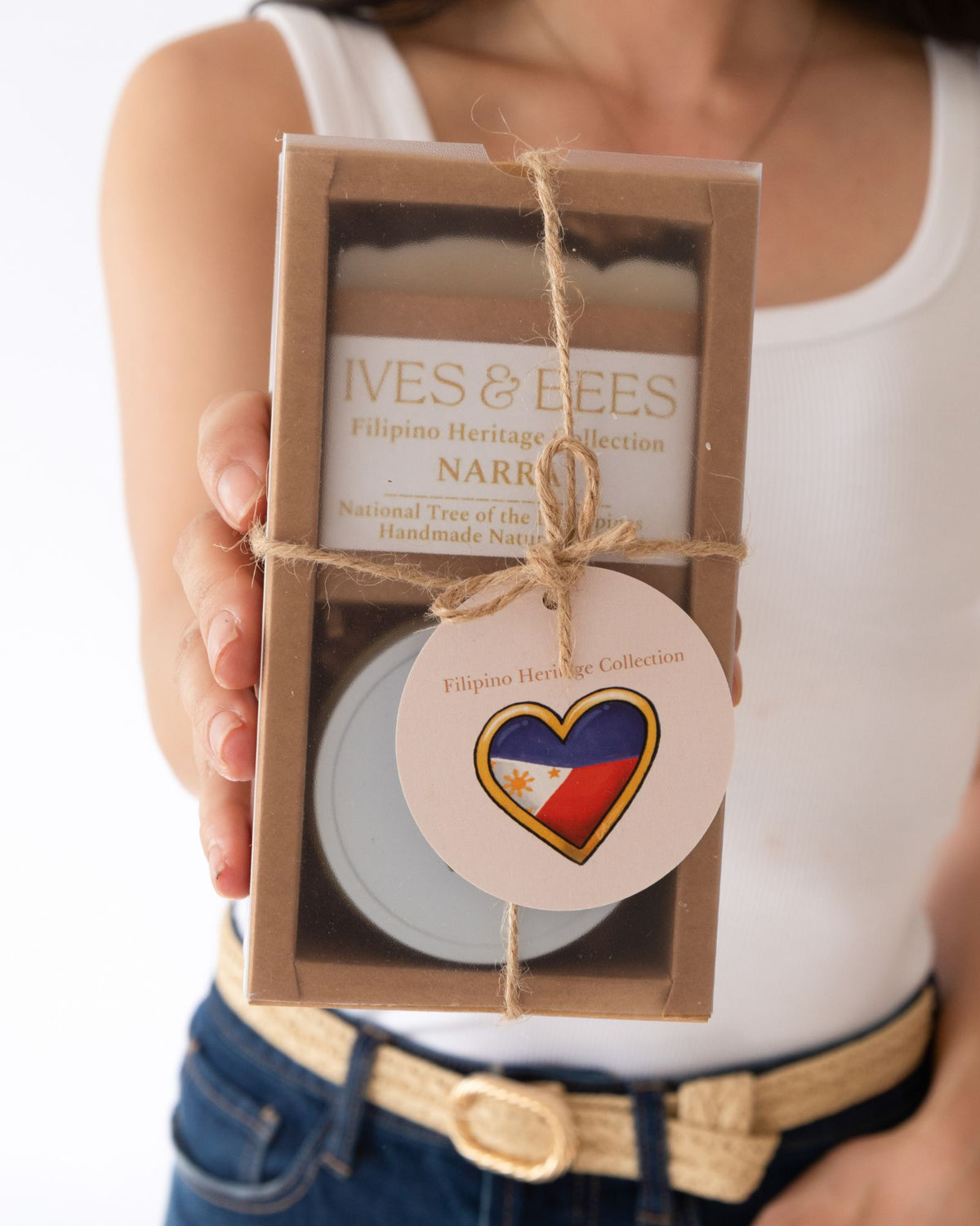 A gift box containing Narra soap and mini candle from Ives & Bees Filipino Heritage Collection. 