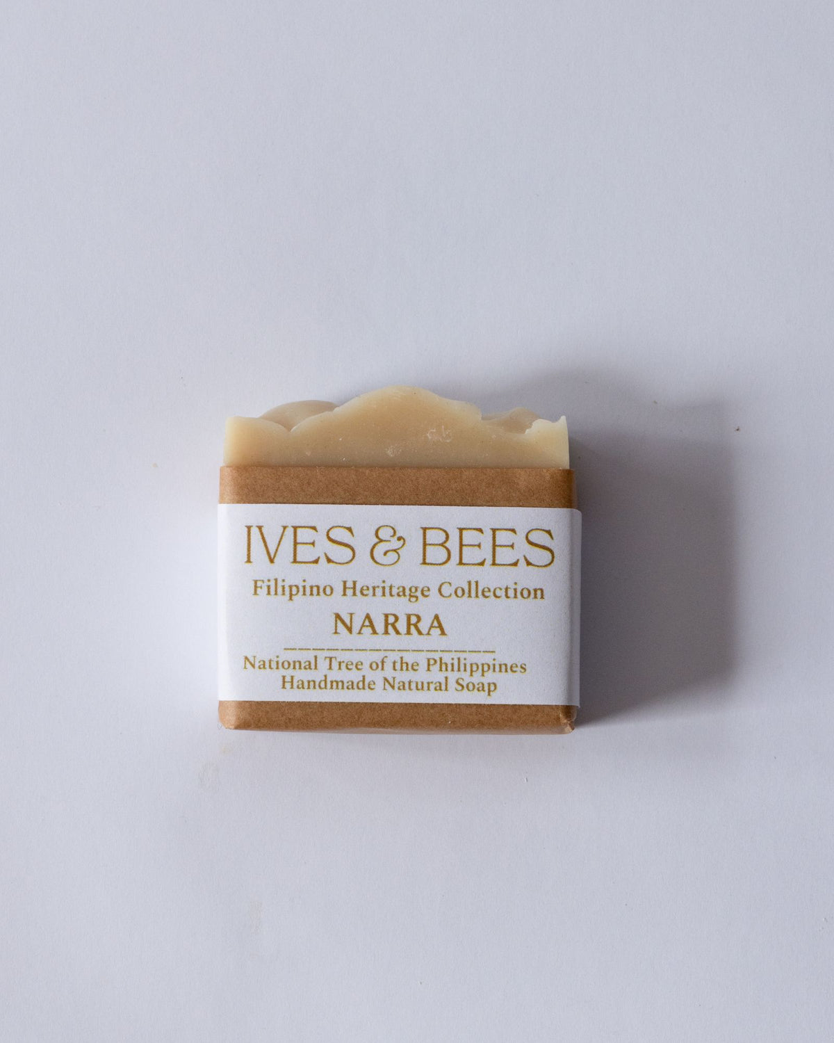 Handmade Narra soap with 'Ives &amp; Bees' packaging on a light gray background
