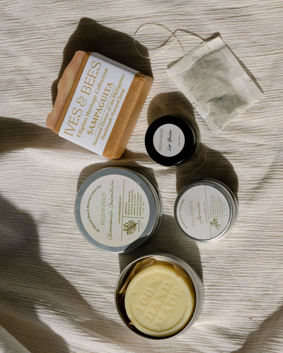 Ives & Bees Nurse Self care kit on a wooden surface