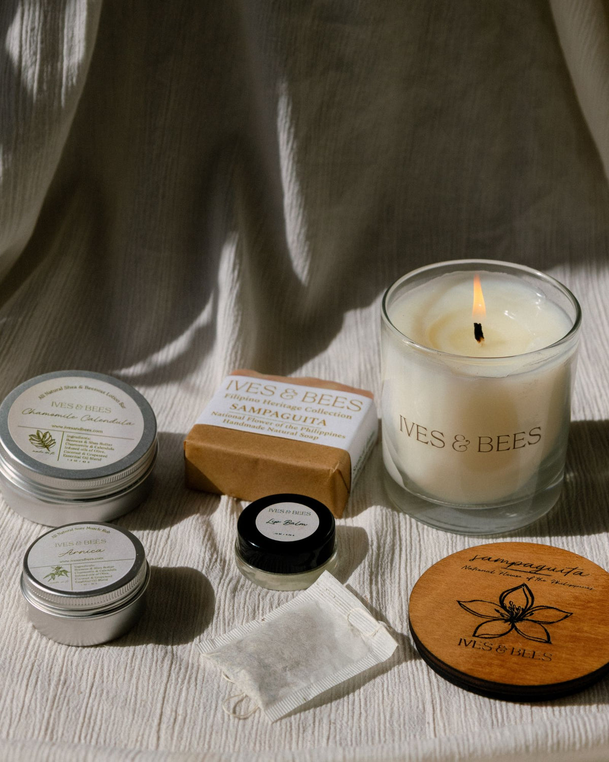 Ives & Bees Nurse Self care kit on a textured surface.