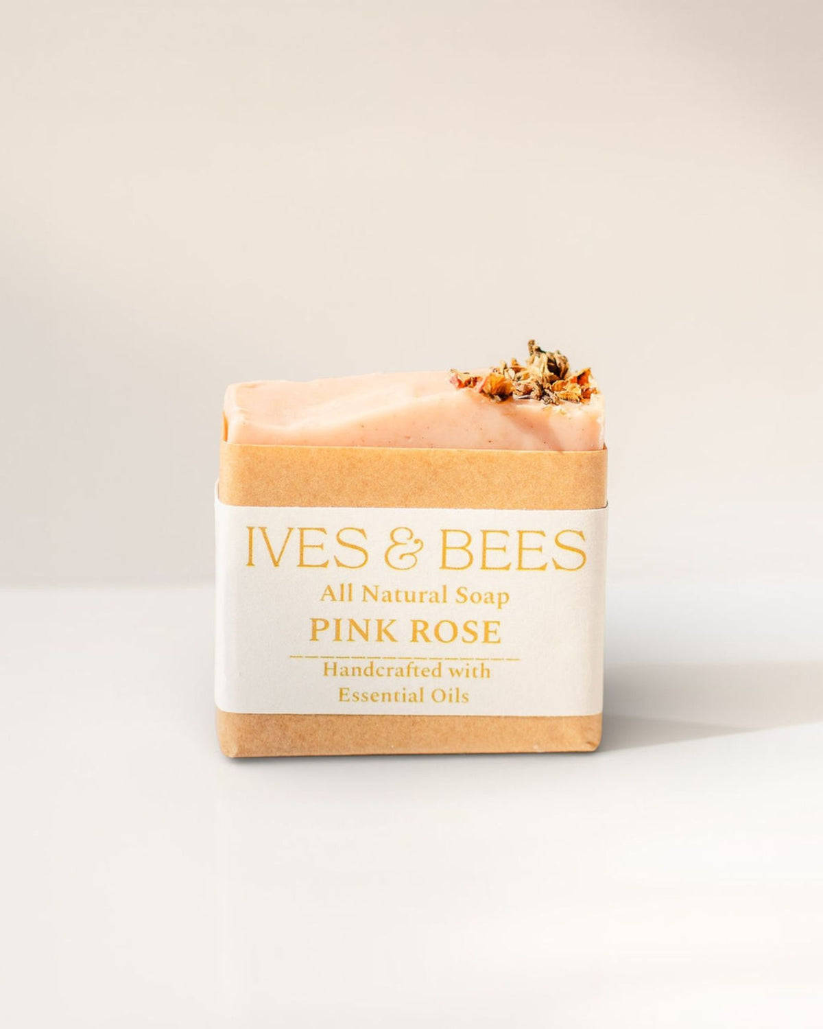 Handmade Pink Rose Soap with 'Ives & Bees' branding on a light background