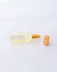 Handmade Natural Mist with gold cap and label on a white background