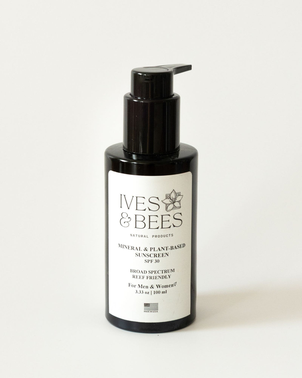 A bottle of Ives & Bees Mineral & Plant-Based Sunscreen SPF 30, featuring a black pump dispenser and a white label, set against a plain light background.